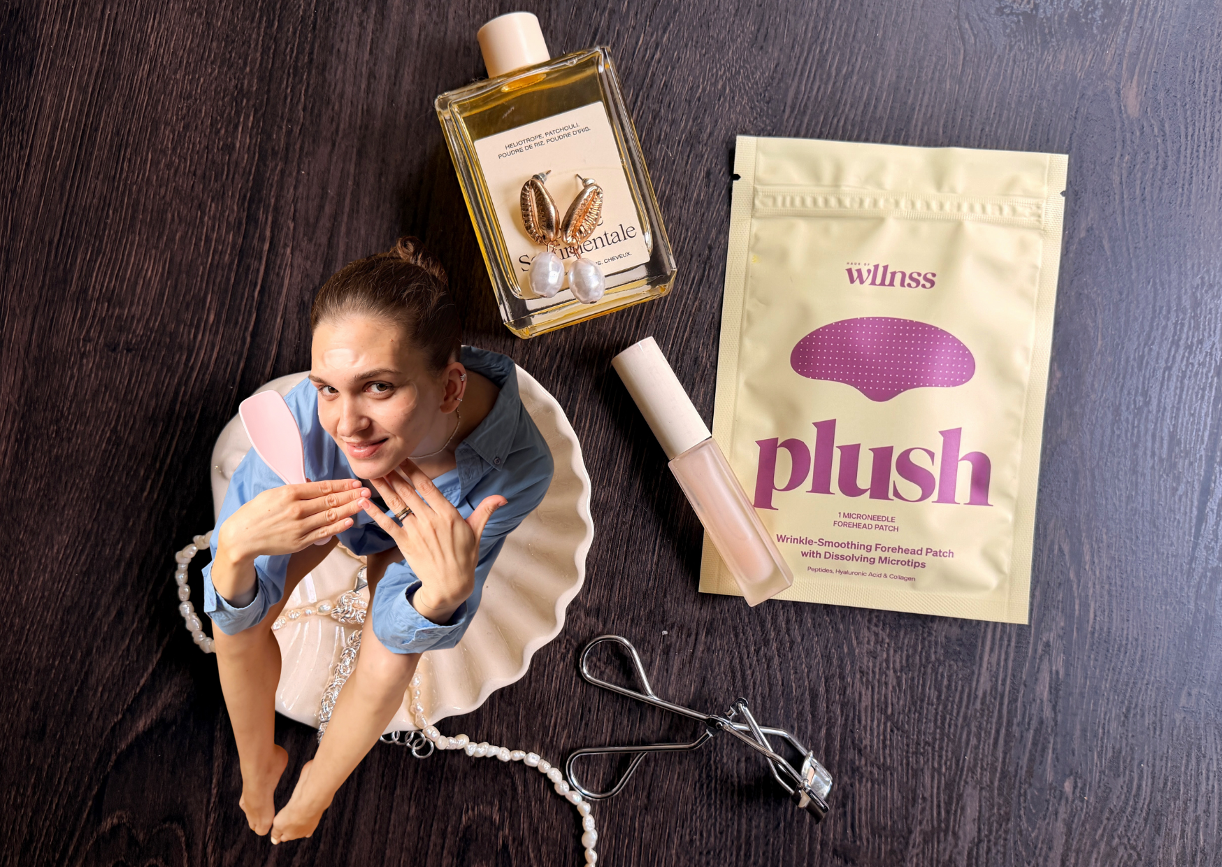 girl eating cherries, wearing heart-shaped microneedle spot patches